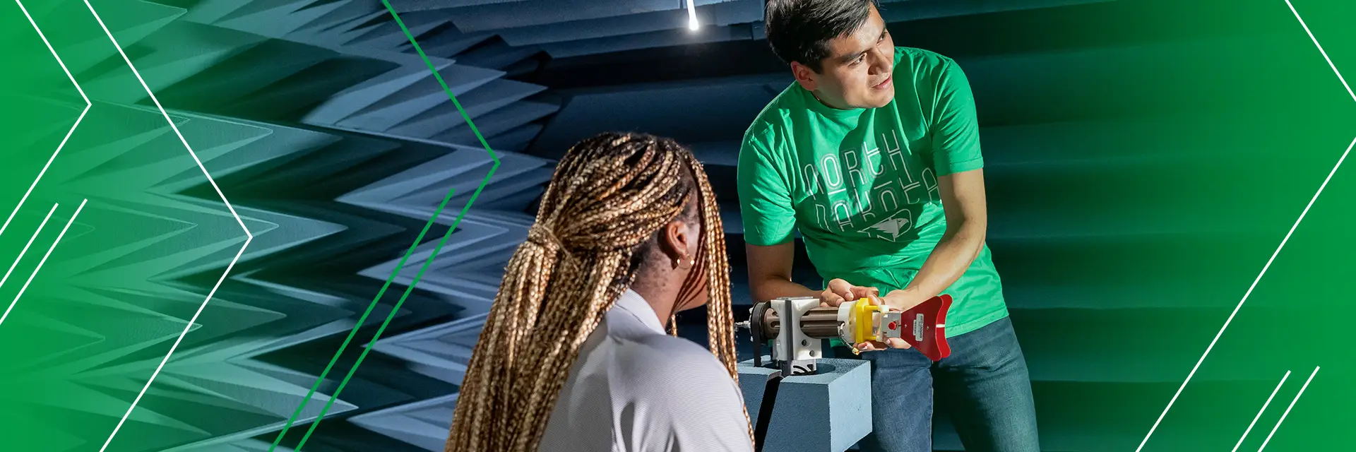 two students work in the virtual reality lab
