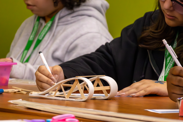 high school students work on a civil engineering project