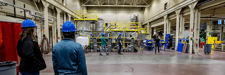 research students in engineering lab